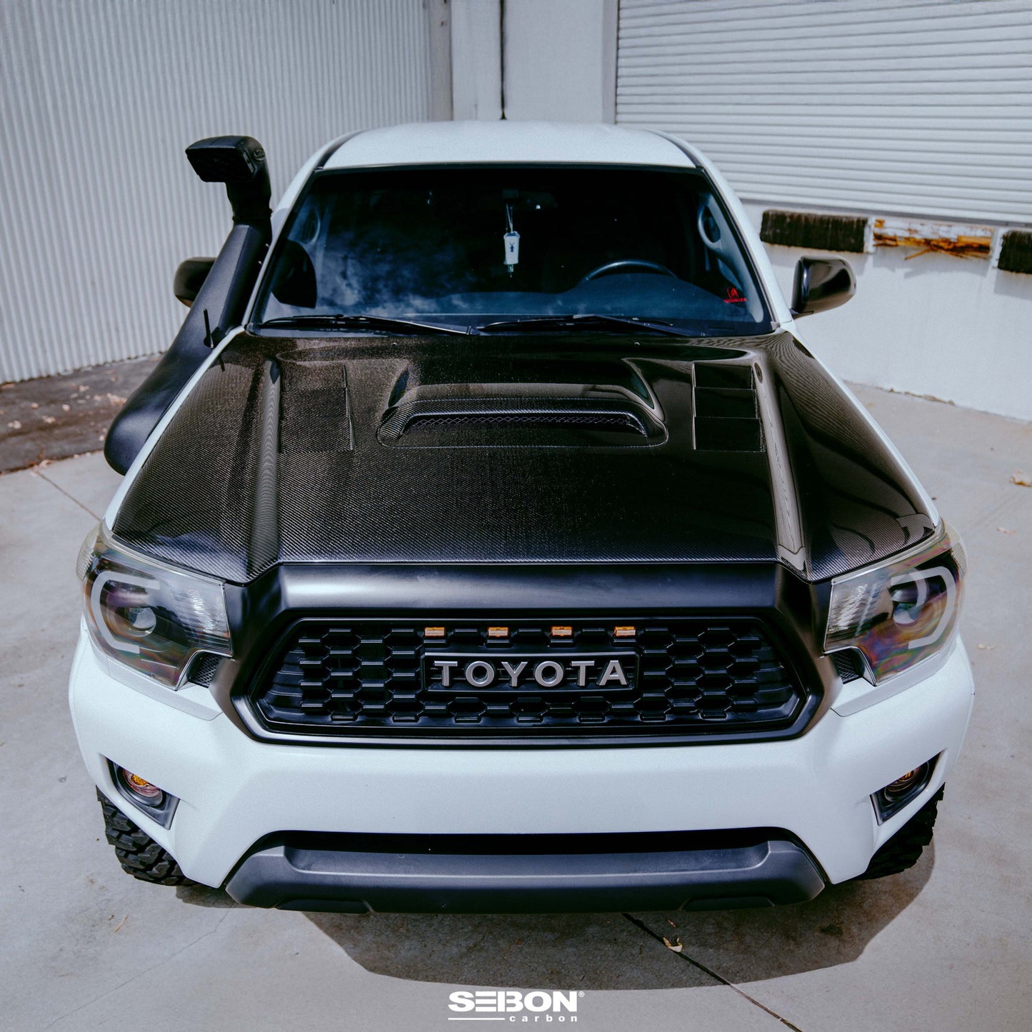 TS-Style Carbon Fiber Hood For 2012-2015 Toyota Tacoma